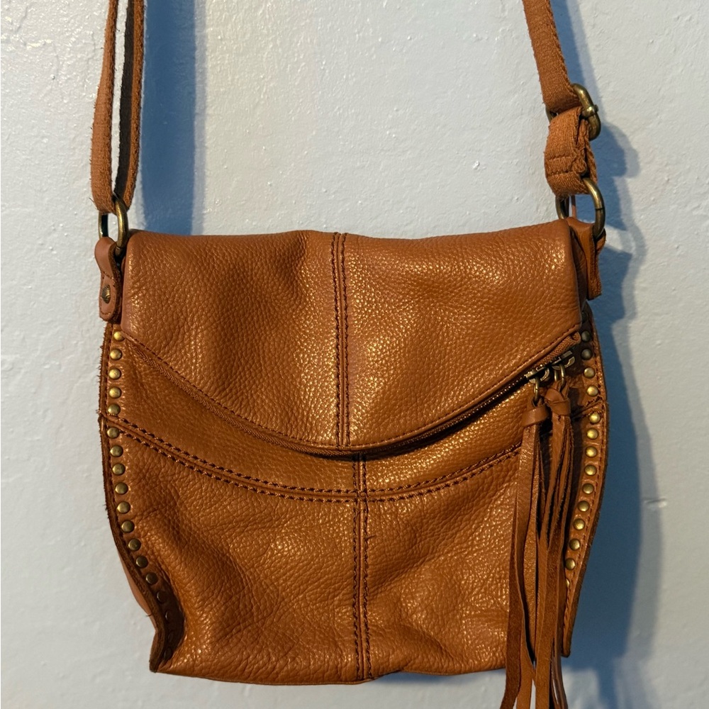 The Sak Crossbody Bag in Cognac Brown with Brass Studs